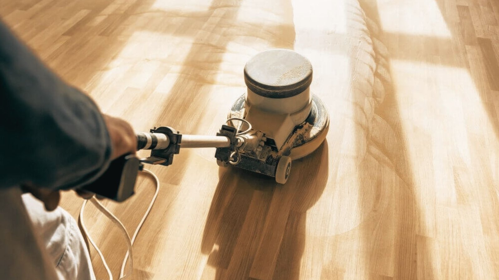Image showing buffing the hardwood of the room.