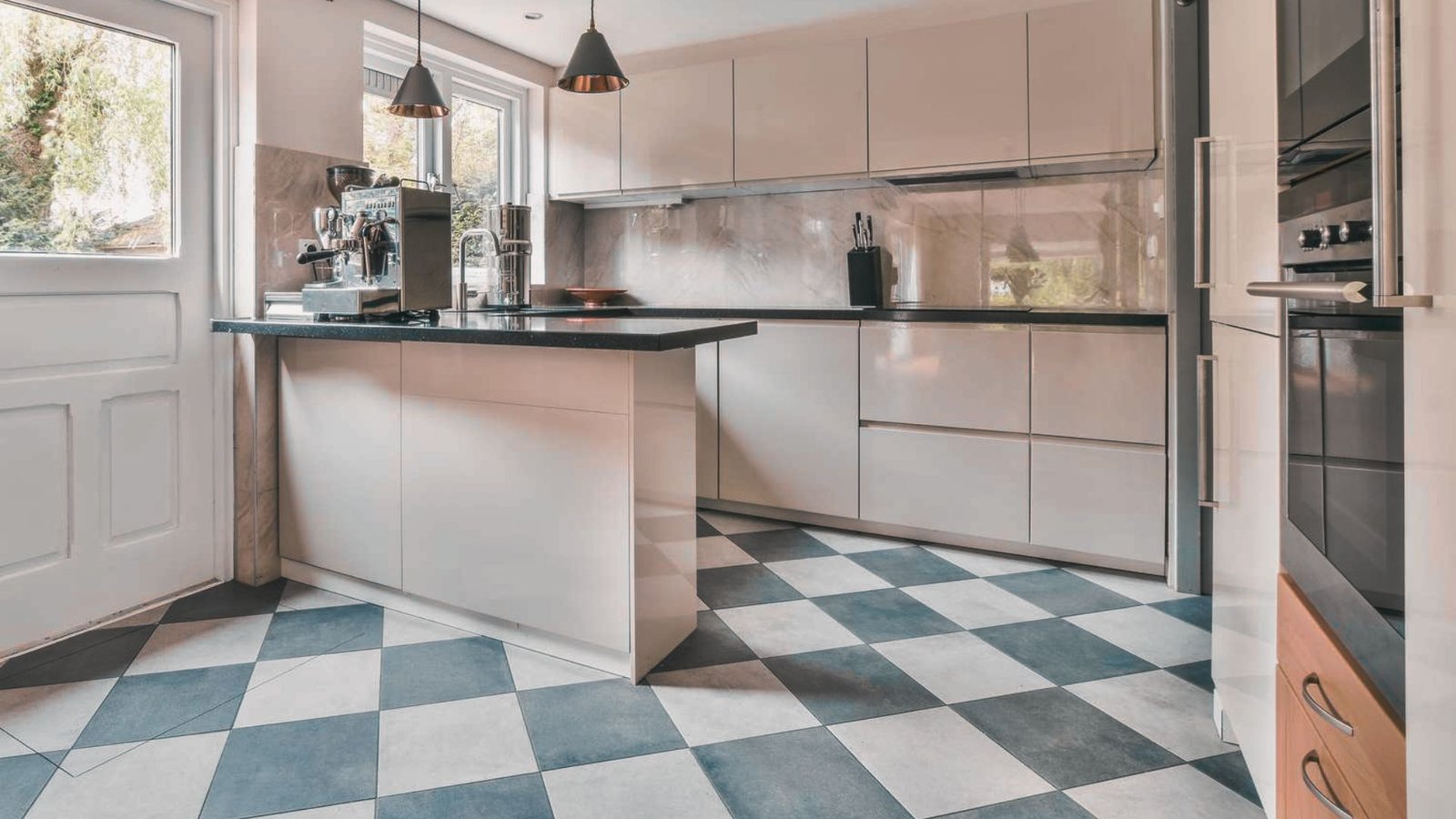 Small Kitchen Floor With Light Tiles.