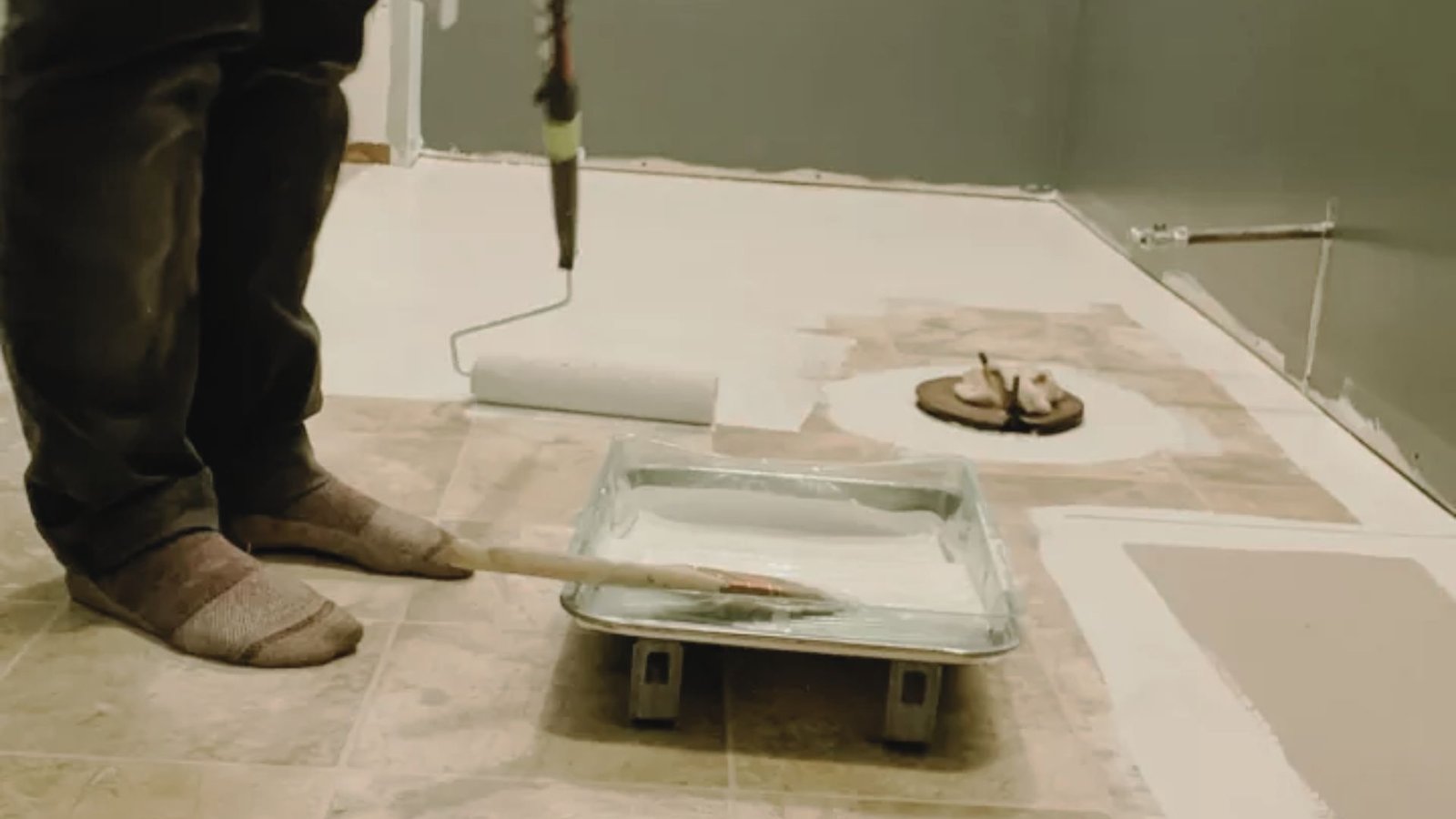 Painting the linoleum floor.